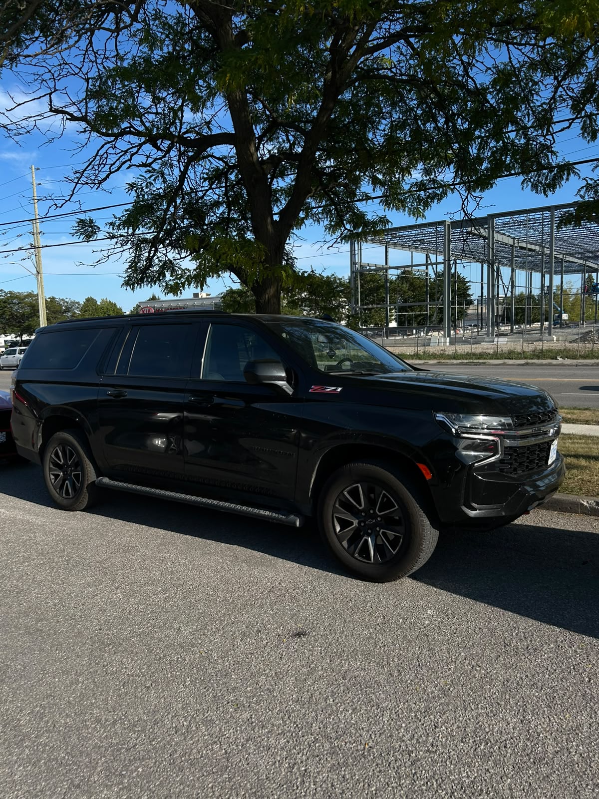 Blacked-out pickup truck rental parked in downtown Toronto