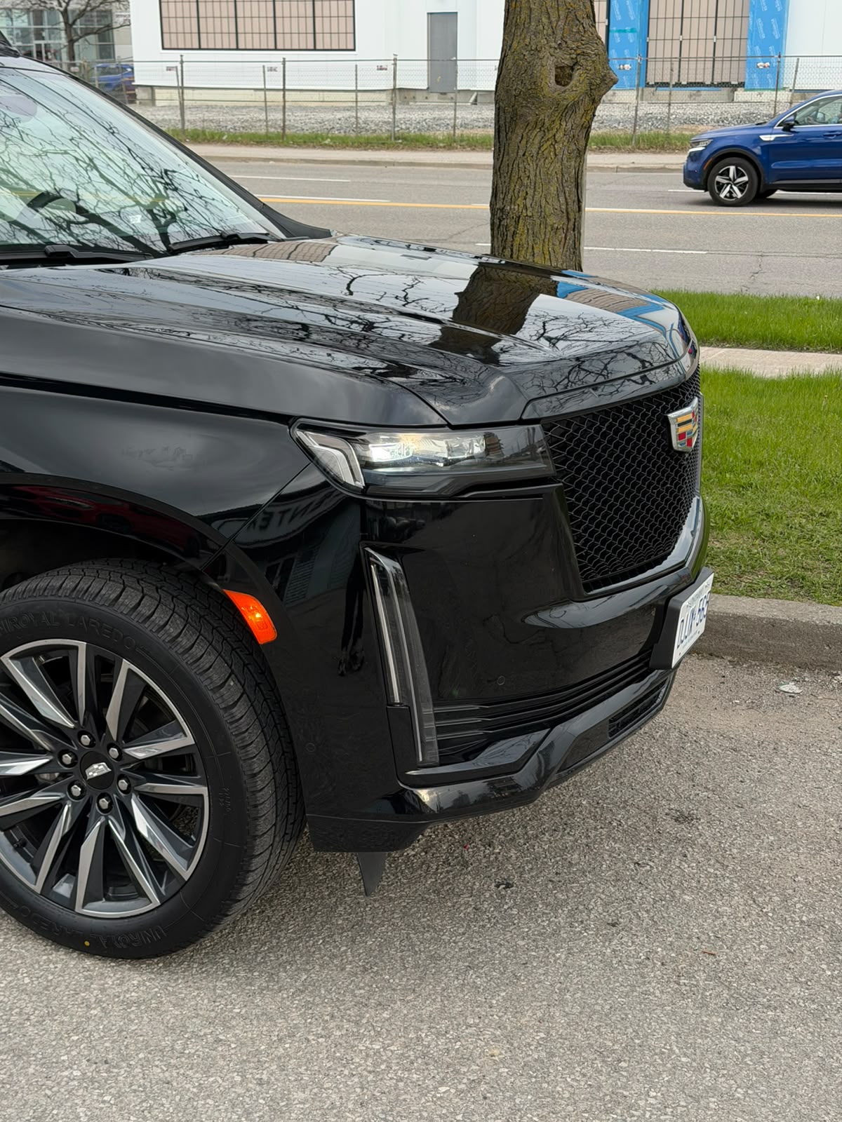 Marriage proposal package in Toronto with a black luxury SUV at night